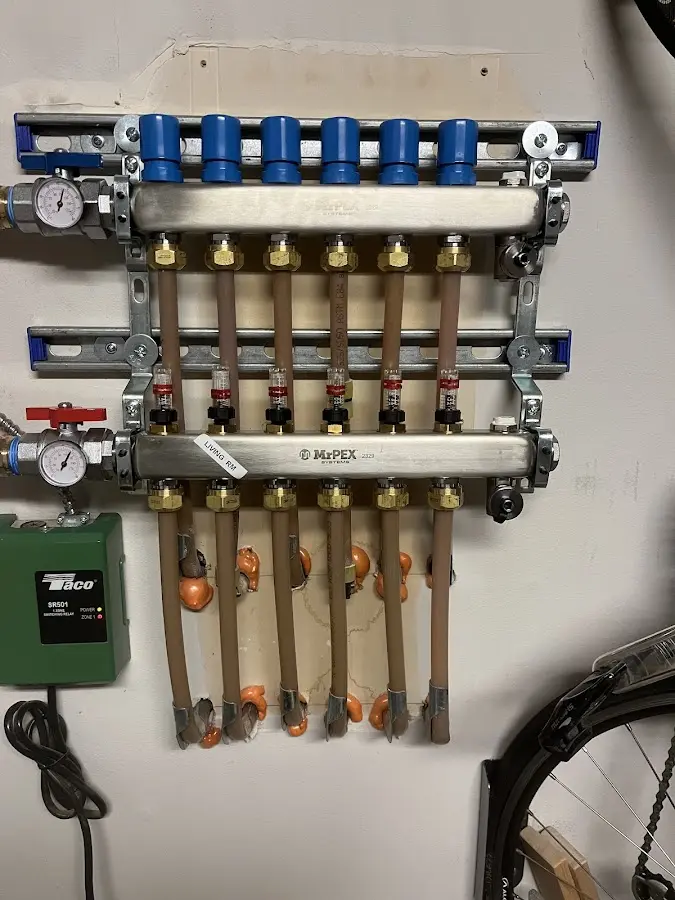 Plumber performing Gas Line Installation at a residential property in Bluefield